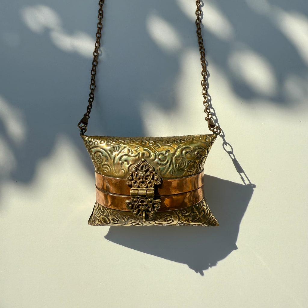 Antique-Style Embossed Brass Pillow Clutch