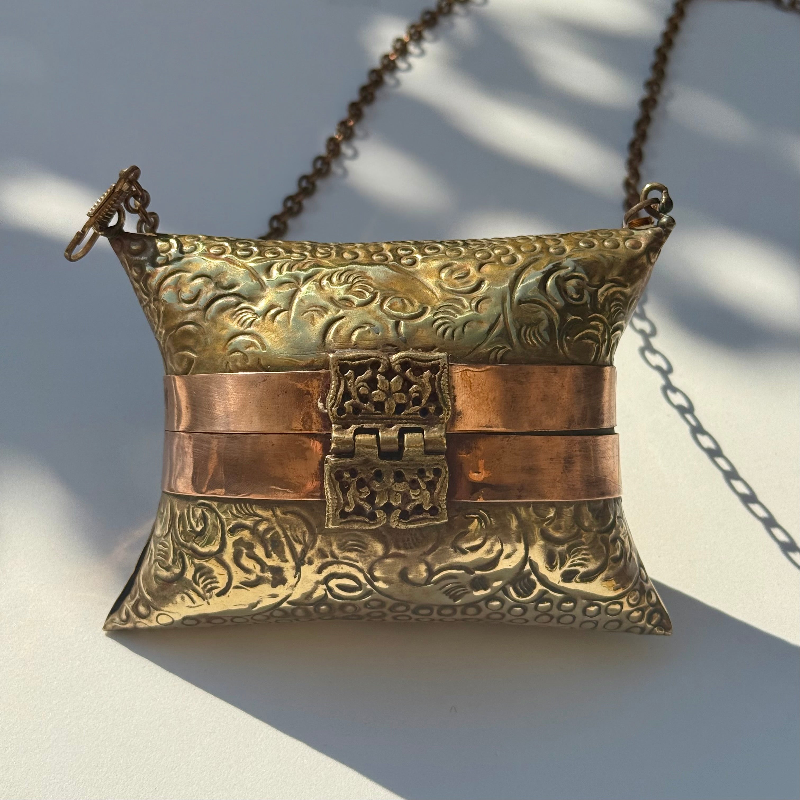 Antique-Style Embossed Brass Pillow Clutch