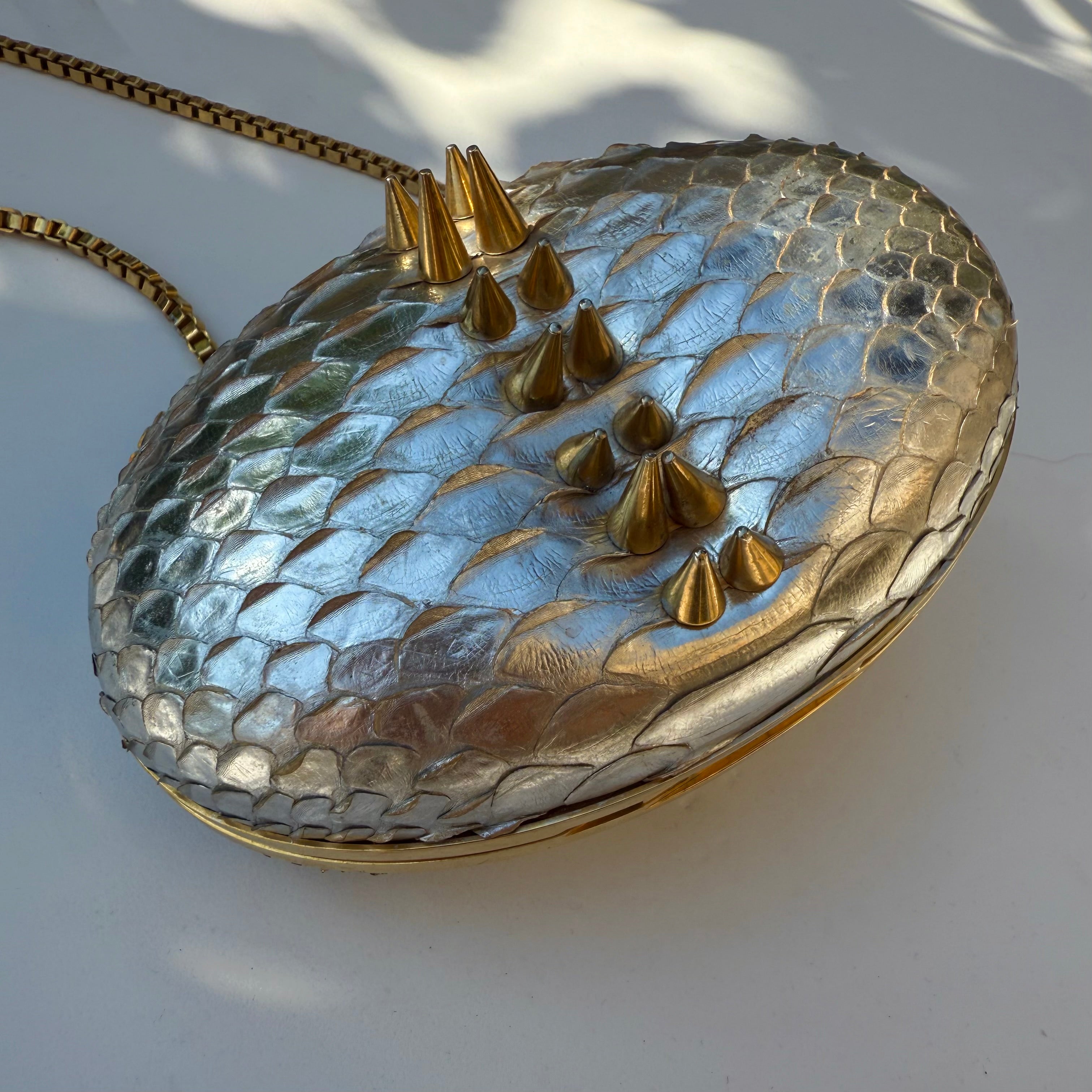 Rami Kadi Silver Python Leather Oval Clutch with Gold Studs