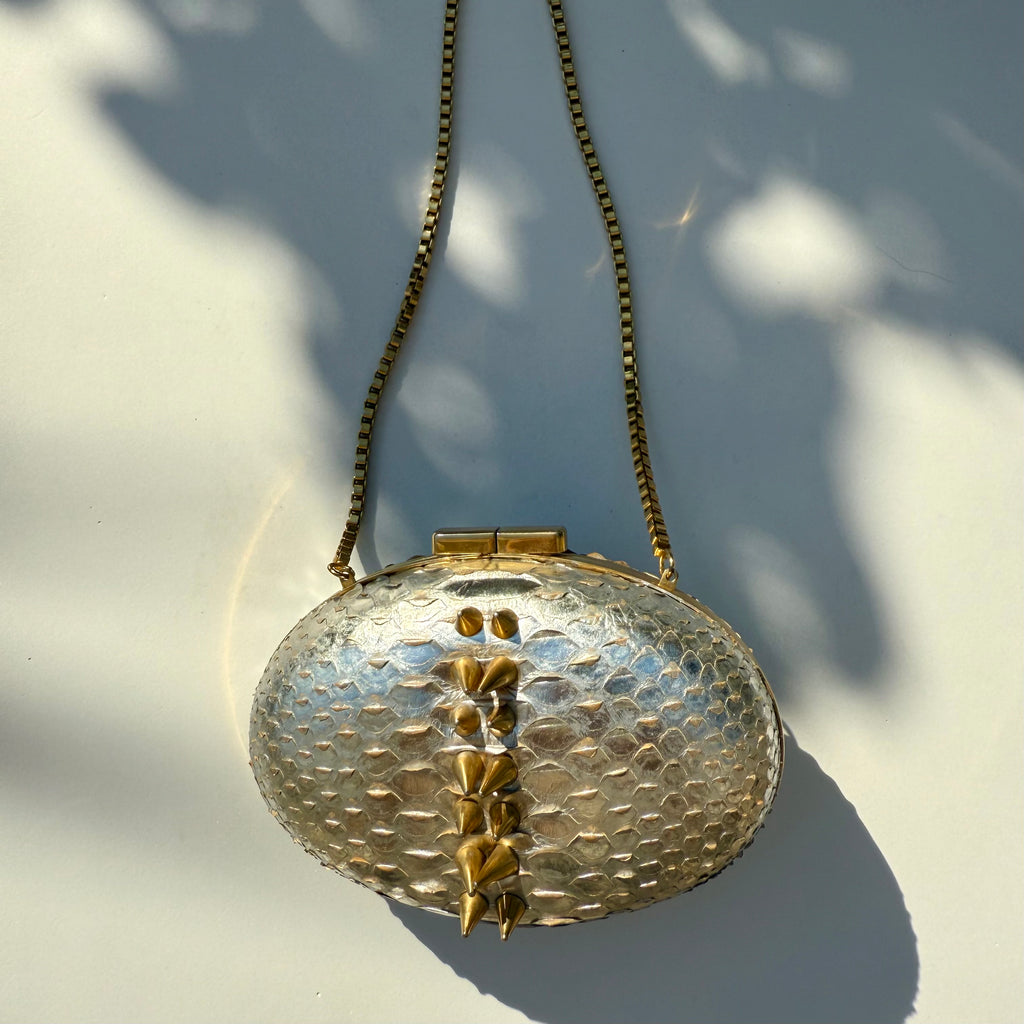 Rami Kadi Silver Python Leather Oval Clutch with Gold Studs