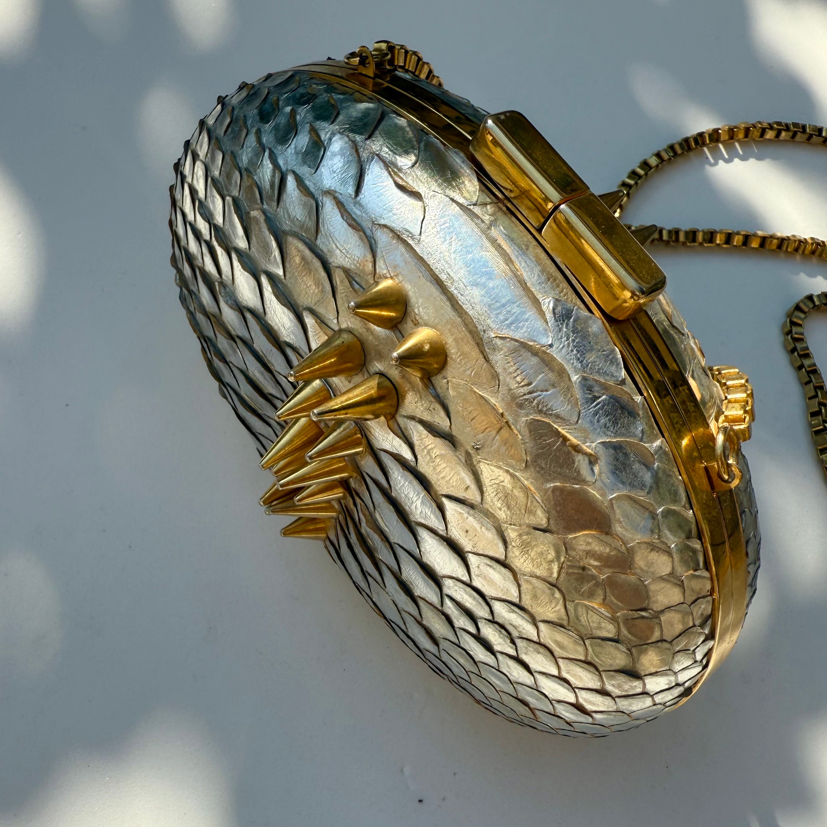 Rami Kadi Silver Python Leather Oval Clutch with Gold Studs