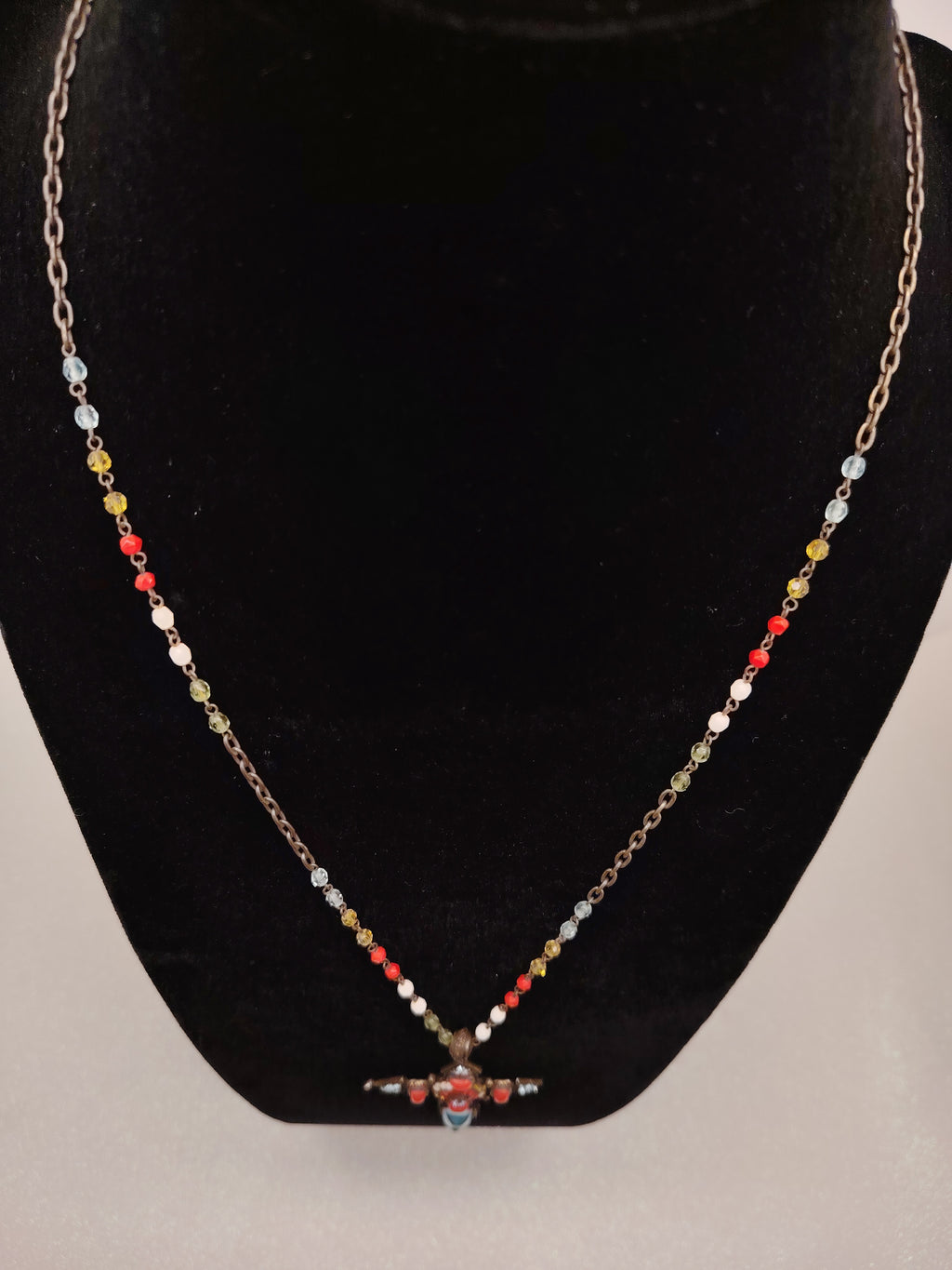 Poggi Paris Coral Glow Rhinestone Cross Necklace
